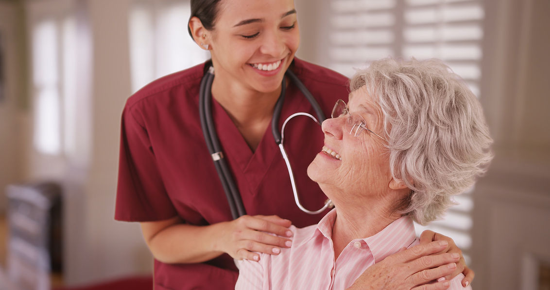 Nurse attends to a senior woman